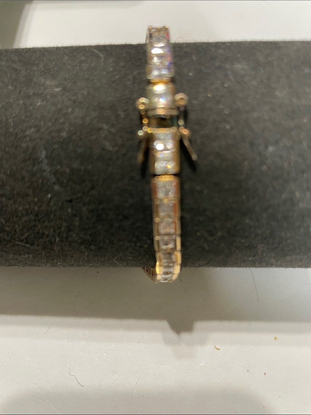 Gold-Tone Tennis Bracelet with Clear Square Stones.  8/11/6
